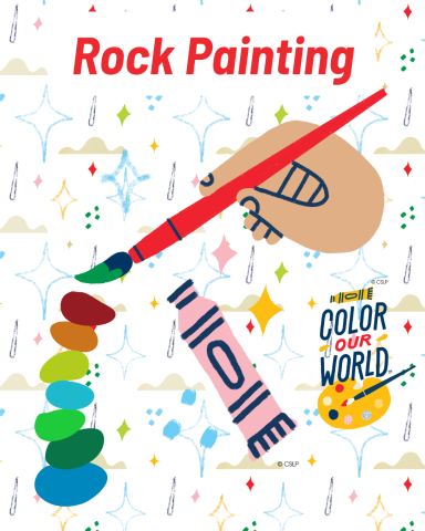 paintbrush painting a stack of colorful rocks