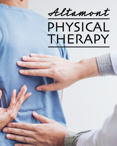 Medical person's hands touching a patient's back